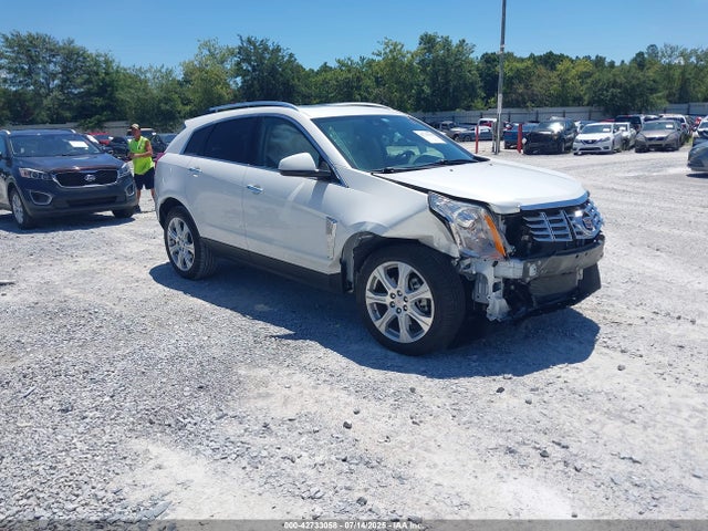 2014 CADILLAC SRX 3GYFNCE33ES598451 Photo 0