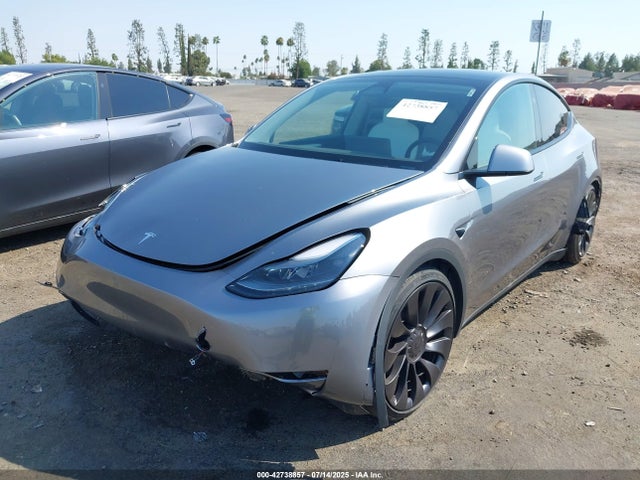 2025 TESLA MODEL Y 7SAYGDEF7SF261071 Photo 1
