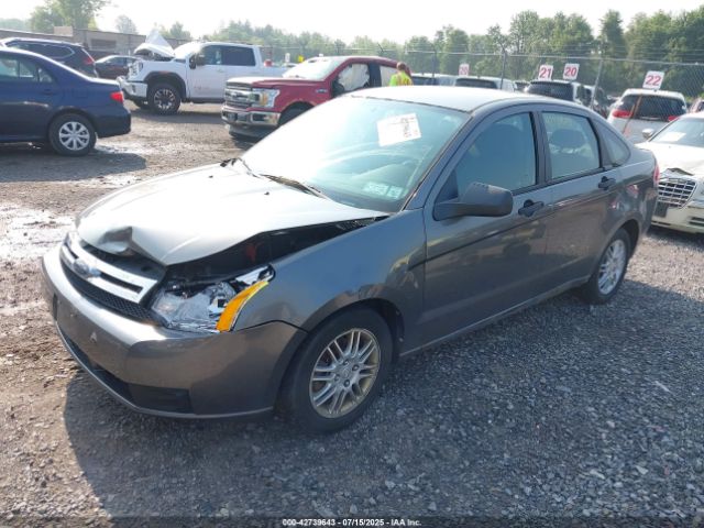 2010 FORD FOCUS 1FAHP3FN9AW152897 Photo 1