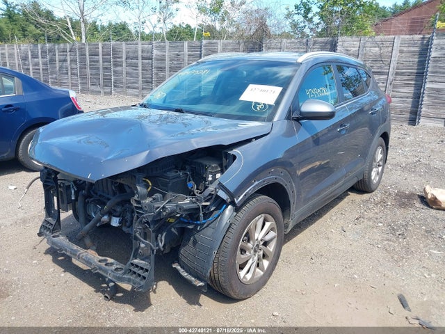 KM8J3CA40GU068750 Hyundai Tucson