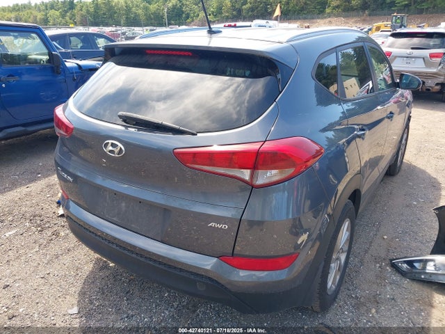 KM8J3CA40GU068750 Hyundai Tucson