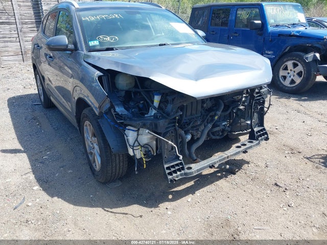 KM8J3CA40GU068750 Hyundai Tucson