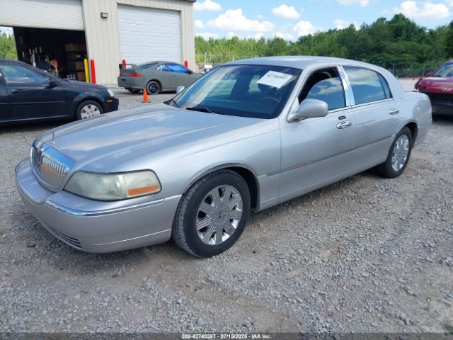 2004 LINCOLN TOWN CAR 1LNHM83WX4Y669949 Photo 1