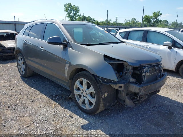2011 CADILLAC SRX 3GYFNBEY3BS500746 Photo 0