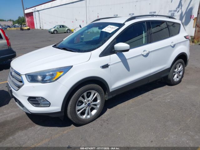 2018 FORD ESCAPE 1FMCU9G99JUC63460 Photo 1