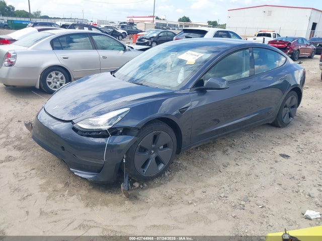 2023 TESLA MODEL 3 5YJ3E1EA8PF704769 Photo 1