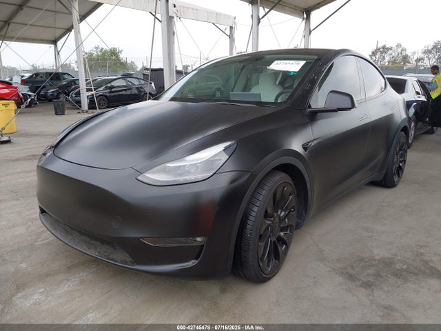 2023 TESLA MODEL Y 7SAYGDEF2PF659490 Photo 1