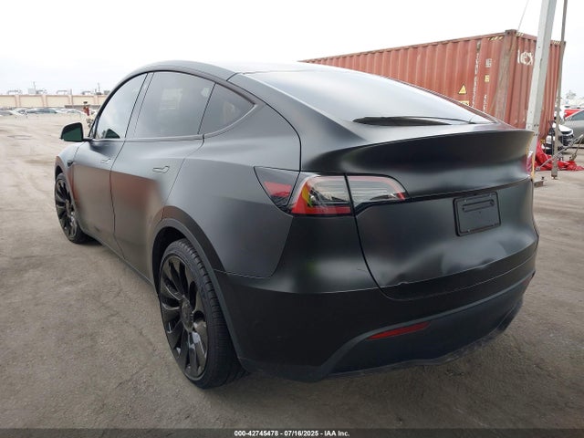 2023 TESLA MODEL Y 7SAYGDEF2PF659490 Photo 2