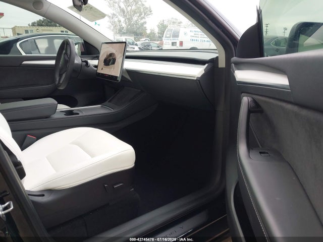 2023 TESLA MODEL Y 7SAYGDEF2PF659490 Photo 4