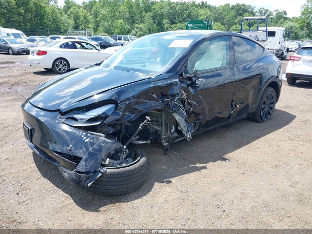 2024 TESLA MODEL Y 7SAYGDEE7RA220292 Photo 1