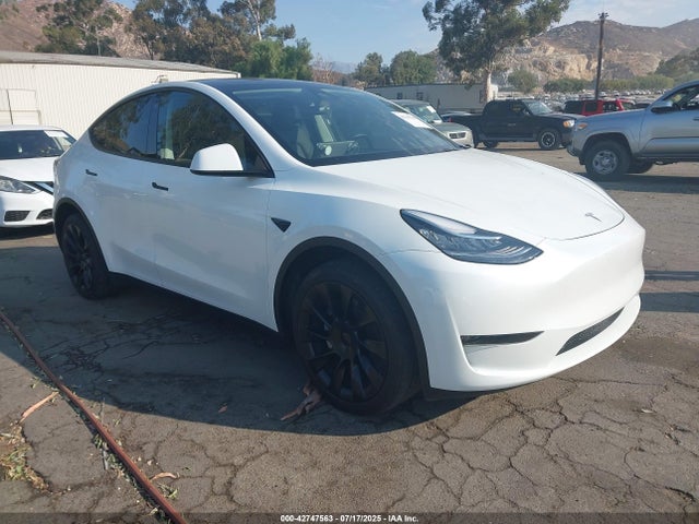 2023 TESLA MODEL Y 7SAYGDEE2PA072212 Photo 0