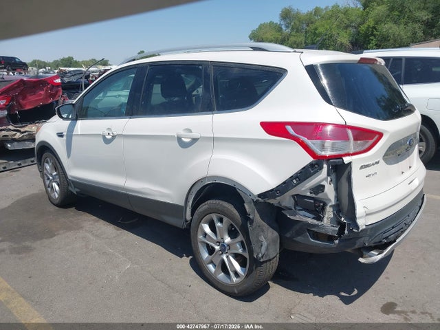 1FMCU0JX1EUB16929 Ford 2014