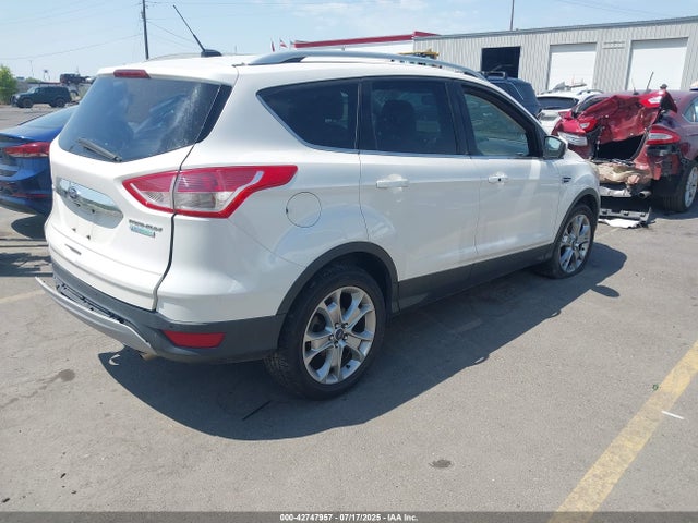 1FMCU0JX1EUB16929 Ford 2014