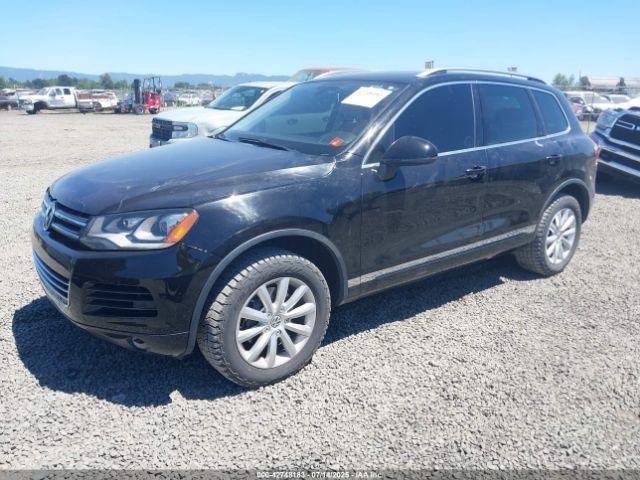2011 VOLKSWAGEN TOUAREG WVGFF9BP7BD007333 Photo 1