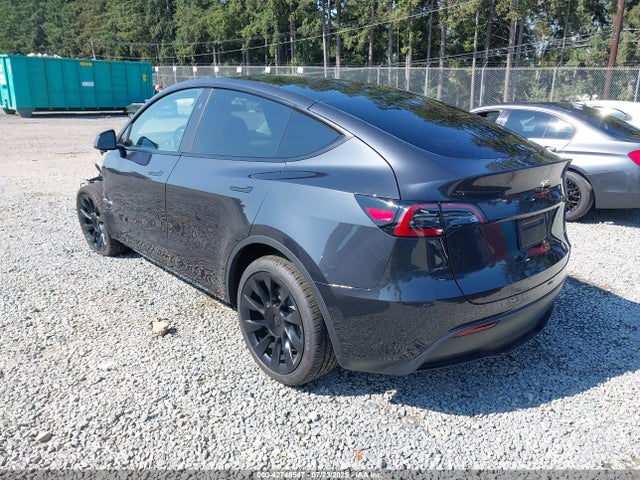 2025 TESLA MODEL Y 7SAYGDEE0SF300090 Photo 2