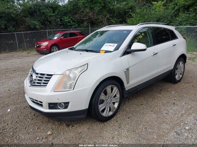 2016 CADILLAC SRX 3GYFNCE35GS533099 Photo 1