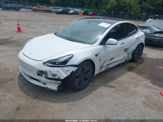 2023 TESLA MODEL 3 5YJ3E1EB2PF599672 Photo 1