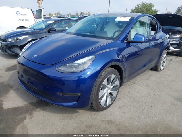 2024 TESLA MODEL Y 7SAYGDEE2RF083023 Photo 1