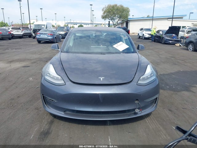5YJ3E1EA3JF050884 Tesla 2018