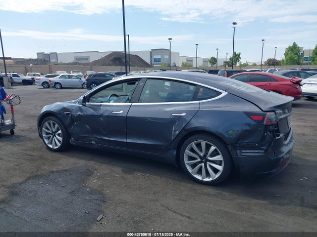 5YJ3E1EA3JF050884 Tesla 2018