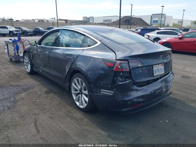 5YJ3E1EA3JF050884 Tesla 2018