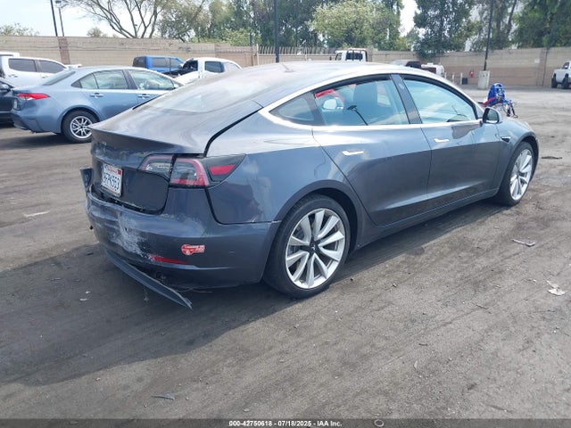 5YJ3E1EA3JF050884 Tesla 2018