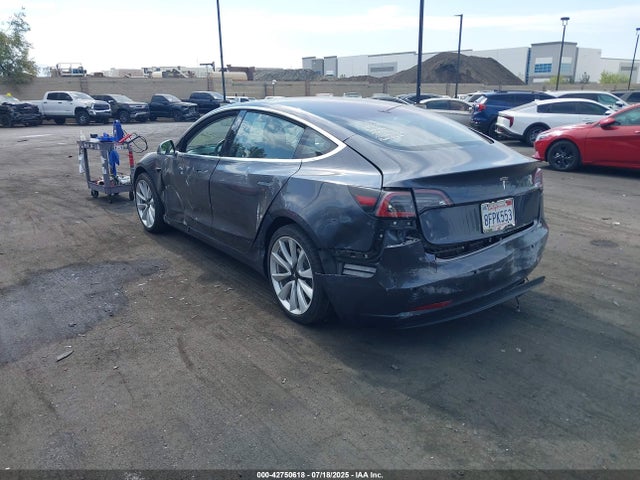 5YJ3E1EA3JF050884 Tesla 2018