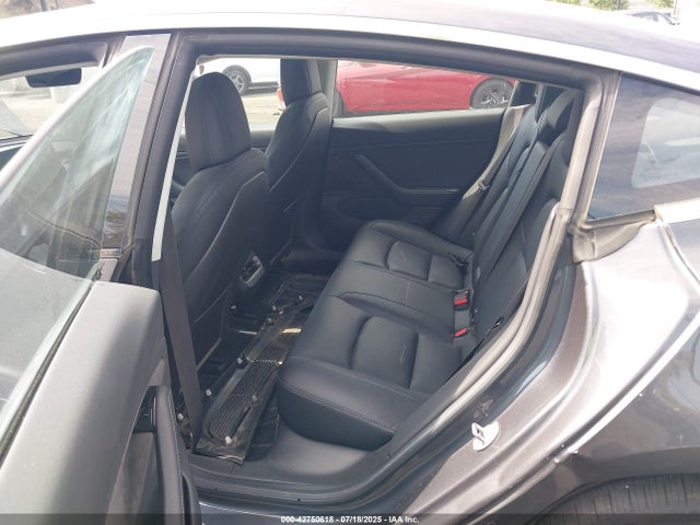 5YJ3E1EA3JF050884 Tesla 2018