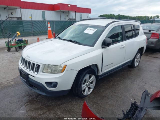 2011 JEEP COMPASS 1J4NF1FB7BD282517 Photo 1