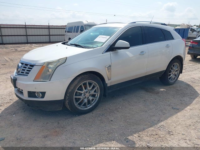2014 CADILLAC SRX 3GYFNDE31ES648494 Photo 1
