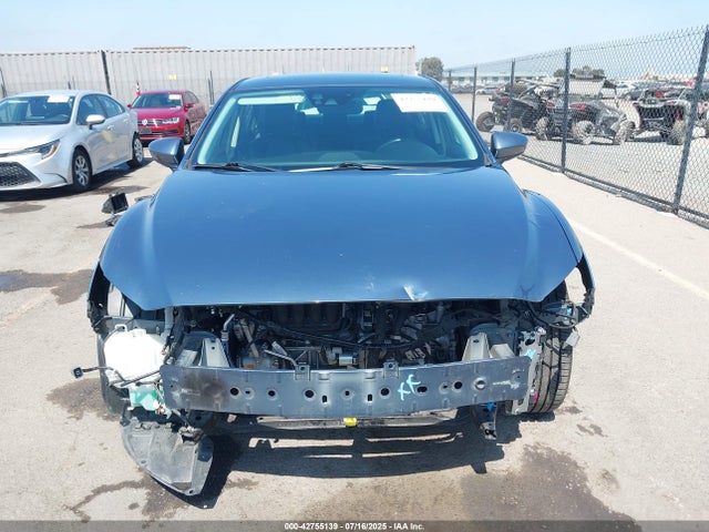JM1GJ1W6XE1134691 Mazda py