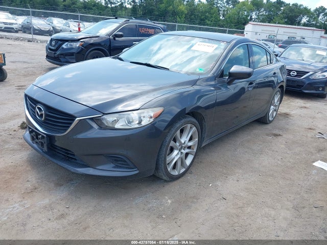 JM1GJ1V51G1402605 Mazda py