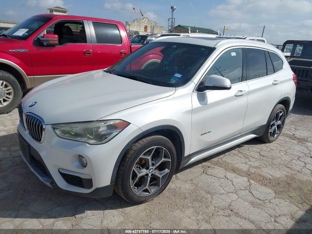 WBXHT3C34G5E52439 BMW X1