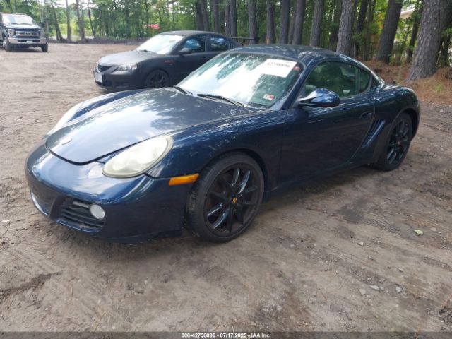 2010 PORSCHE CAYMAN WP0AA2A89AU760911 Photo 1
