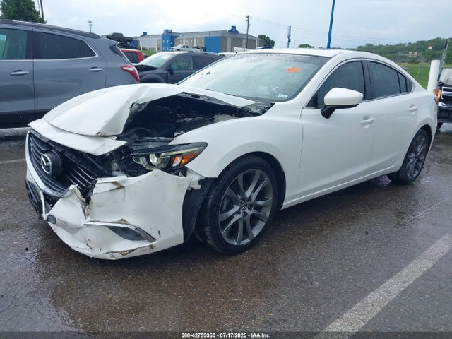 JM1GJ1W56G1412352 Mazda py