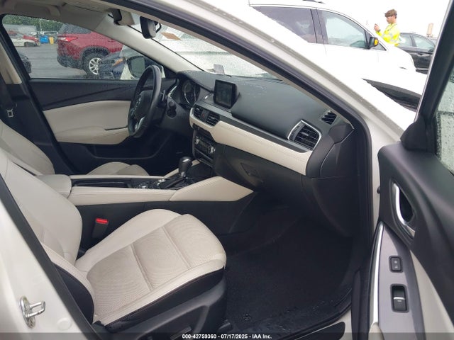 JM1GJ1W56G1412352 Mazda py