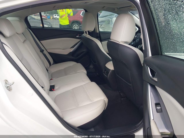 JM1GJ1W56G1412352 Mazda py