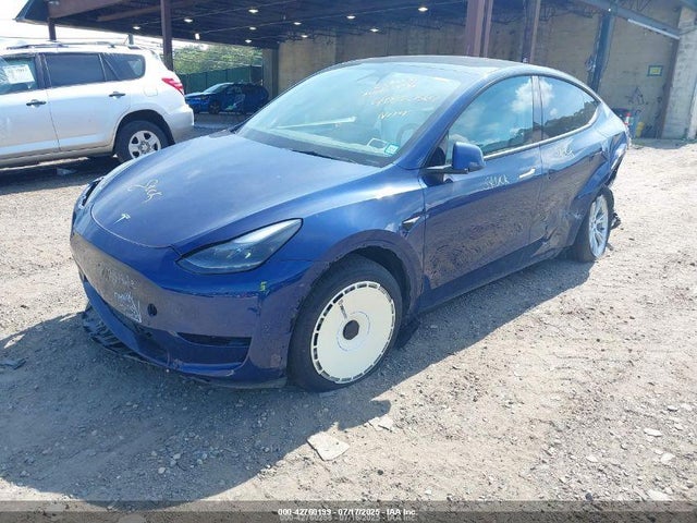 2023 TESLA MODEL Y 7SAYGDEE8PF895214 Photo 1