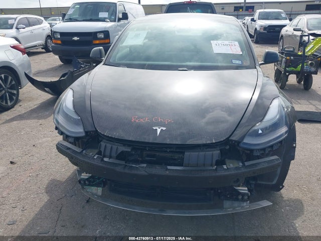 5YJ3E1EC9MF065041 Tesla 2021