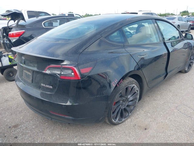5YJ3E1EC9MF065041 Tesla 2021