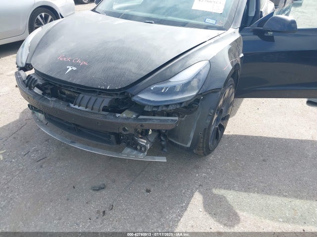 5YJ3E1EC9MF065041 Tesla 2021