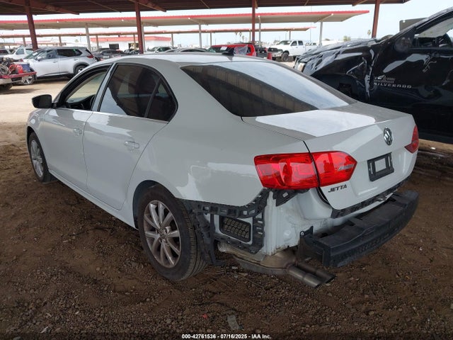 3VWD17AJ2EM315897 Volkswagen Jetta