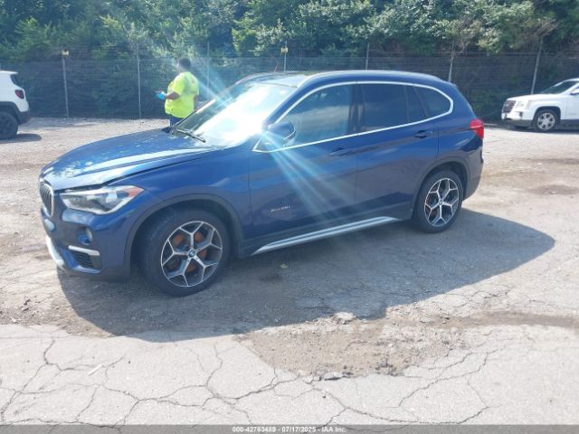 2017 BMW X1 WBXHT3C32H5F72371 Photo 1