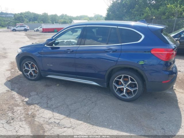 2017 BMW X1 WBXHT3C32H5F72371 Photo 2