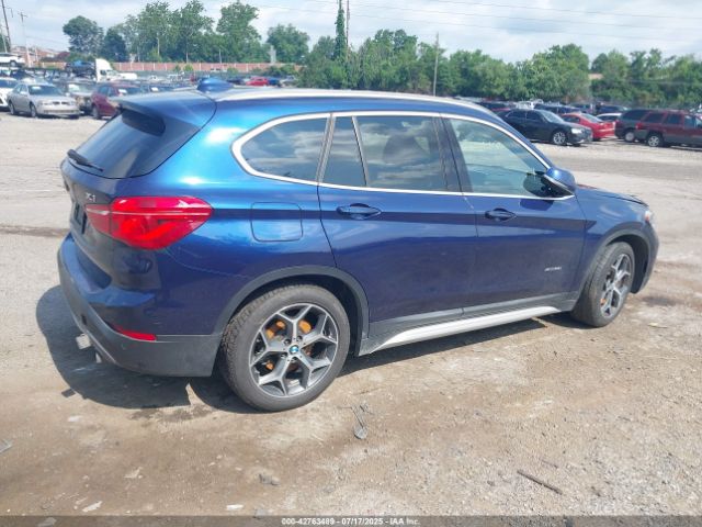 2017 BMW X1 WBXHT3C32H5F72371 Photo 3
