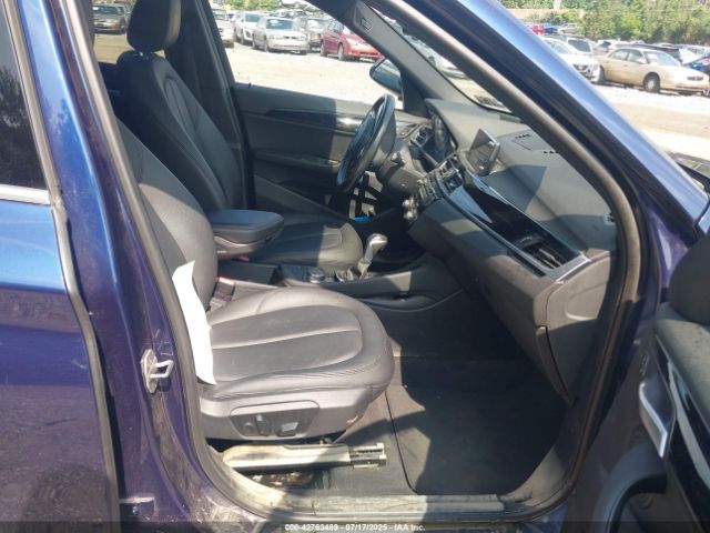 2017 BMW X1 WBXHT3C32H5F72371 Photo 4