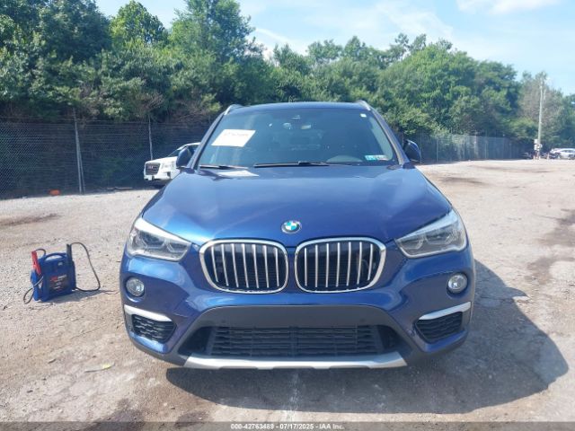 2017 BMW X1 WBXHT3C32H5F72371 Photo 5