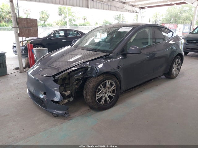 2023 TESLA MODEL Y 7SAYGDEE8PA135913 Photo 1