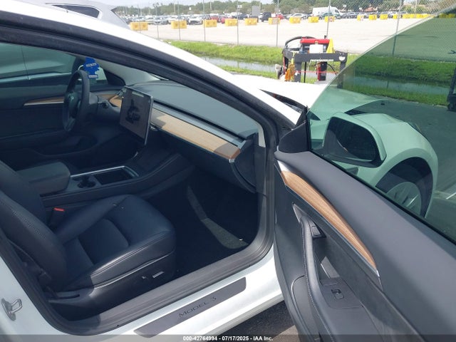 2023 TESLA MODEL 3 5YJ3E1EA2PF428752 Photo 4