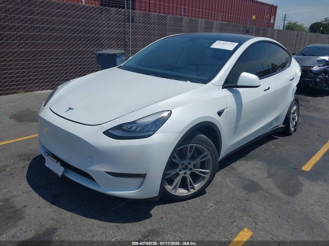 2023 TESLA MODEL Y 7SAYGDEE8PA034371 Photo 1